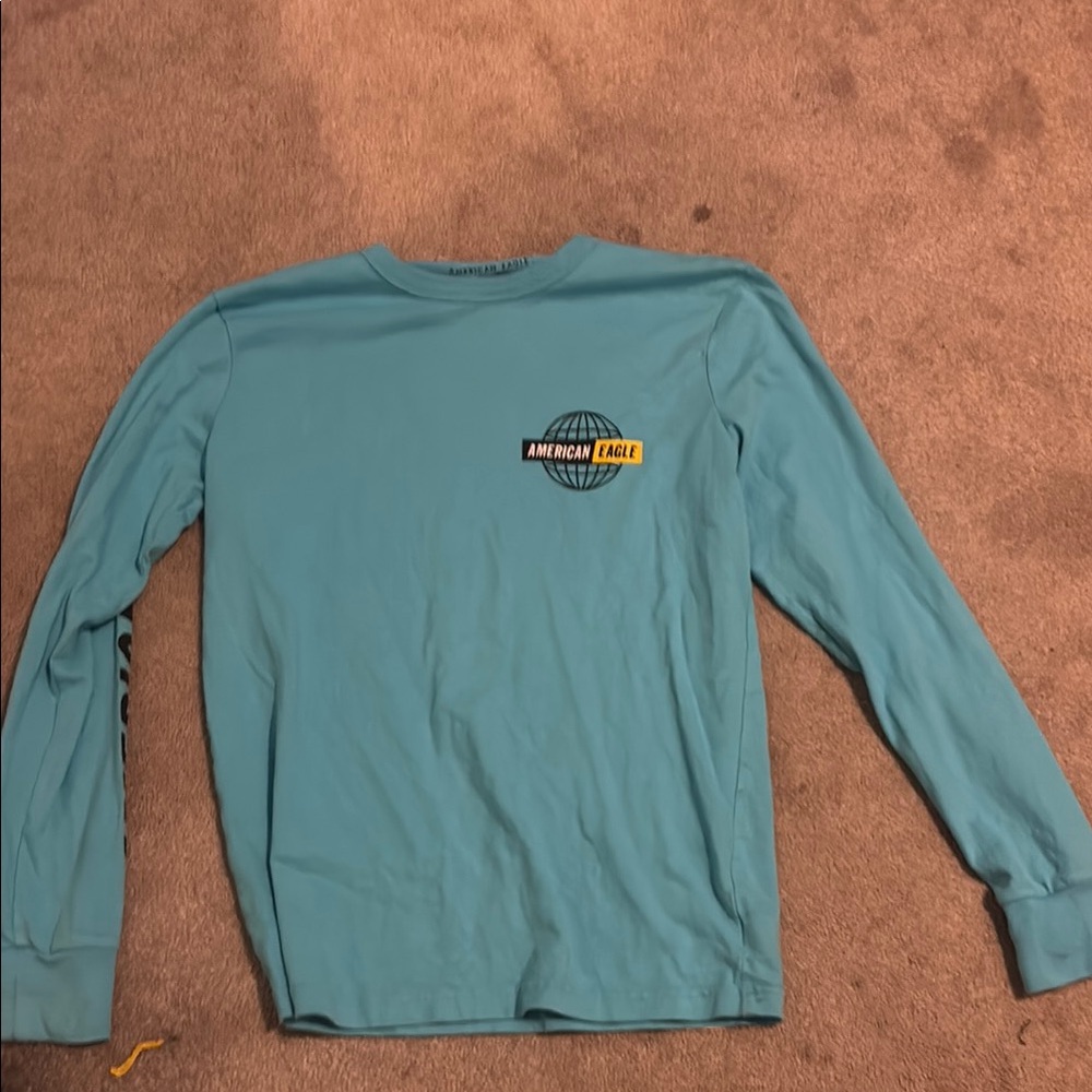 American Eagle Turquoise Globe Graphic Long Sleeve